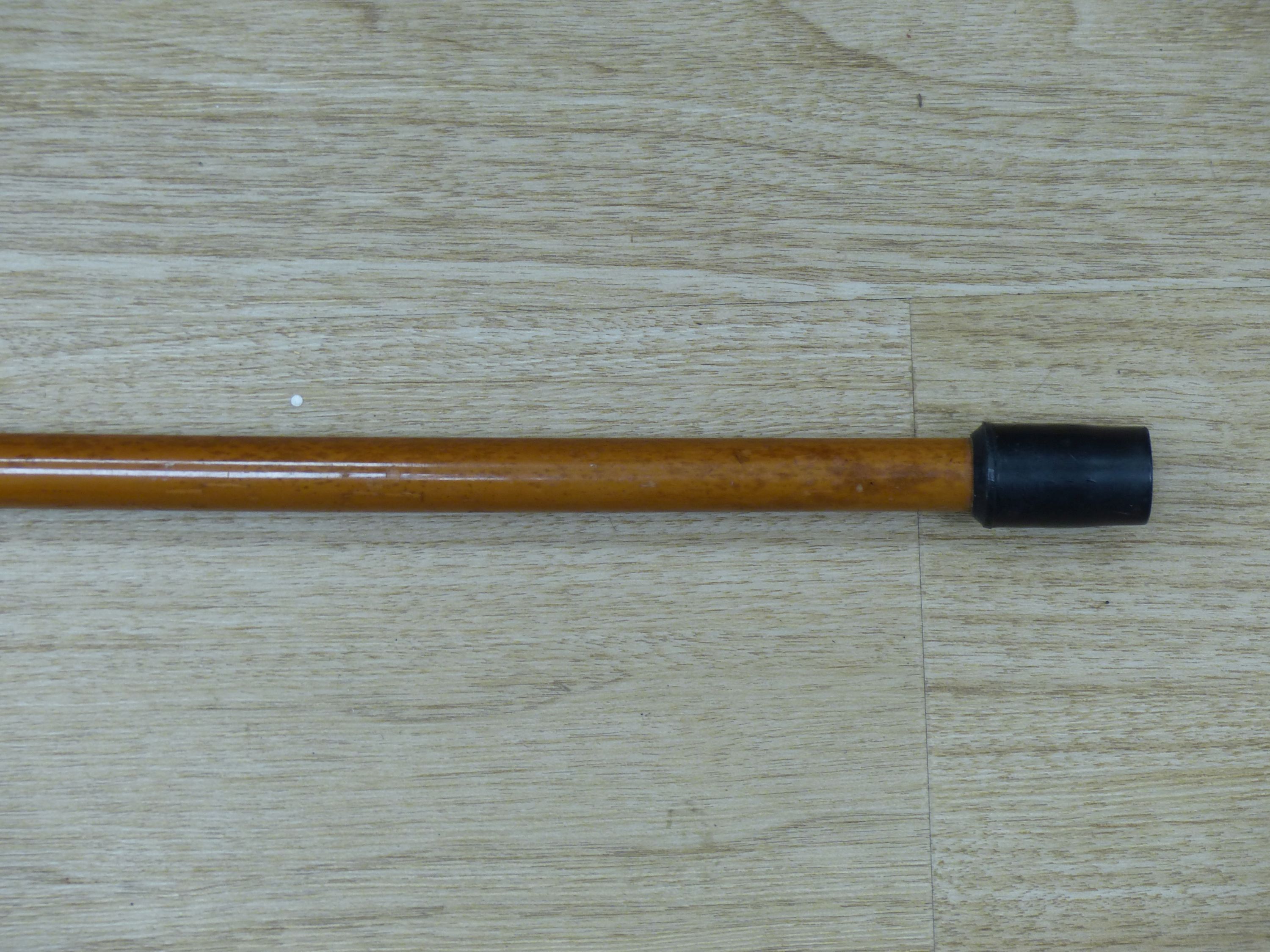 Art Art Deco walking stick with amber-coloured Bakelite handle and 18ct gold band, length 81cm